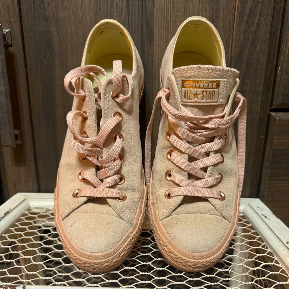 Converse size 8, rose gold leather outside. Gently used.